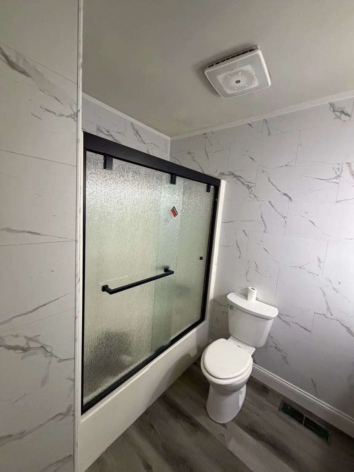 Bathroom remodel with updated shower enclosure